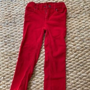 Bright red corduroy pants